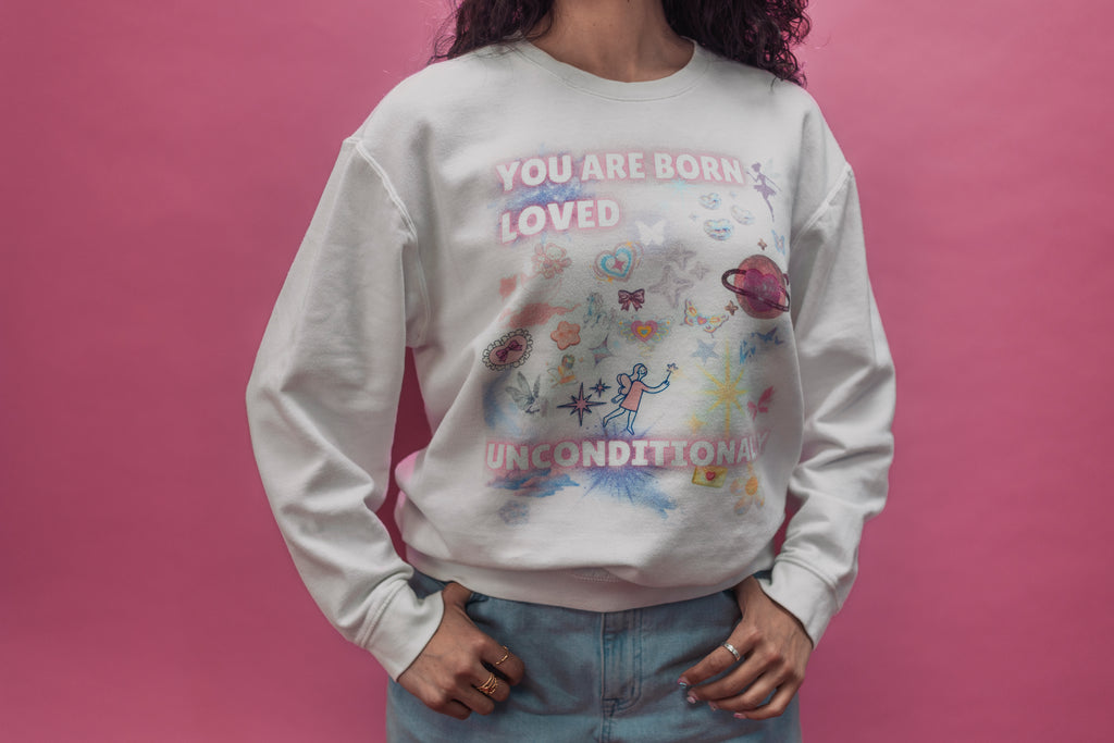 YOU ARE BORN LOVED UNCONDITIONALLY Unisex garment-dyed fleece crewneck sweatshirt